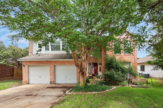 1306 River Oak Dr, Leander, TX 78641 - view of front of house featuring an attached garage, concrete driveway, and brick siding