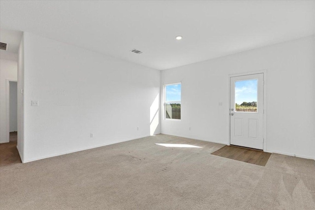 14320 Tordillo Dr, Elgin, TX 78621 - carpeted empty room featuring recessed lighting and baseboards
