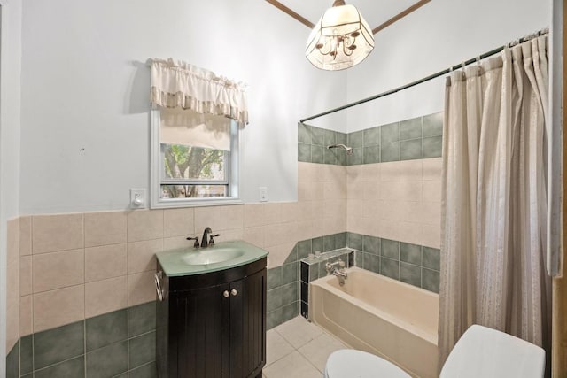 1001 S Gabriel Dr, Leander, TX 78641 - full bathroom featuring tile walls, vanity, shower / tub combo with curtain, and tile patterned flooring