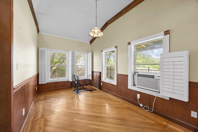 1001 S Gabriel Dr, Leander, TX 78641 - unfurnished room featuring ornamental molding, wainscoting, wood finished floors, wood walls, and cooling unit