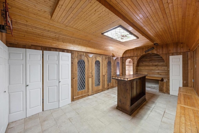 1001 S Gabriel Dr, Leander, TX 78641 - wine cellar with wood walls, lofted ceiling, wood ceiling, and arched walkways