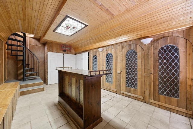 1001 S Gabriel Dr, Leander, TX 78641 - wine cellar with wood walls, lofted ceiling, wooden ceiling, and light tile patterned floors
