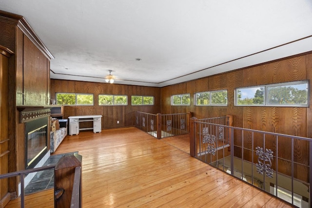 1001 S Gabriel Dr, Leander, TX 78641 - hall with wood finished floors and wooden walls