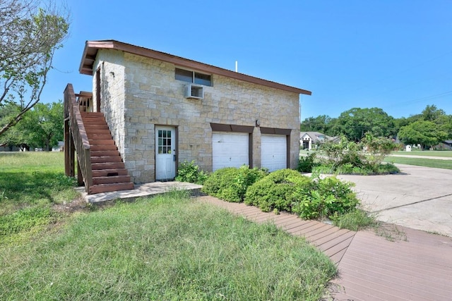 1001 S Gabriel Dr, Leander, TX 78641 - view of front of home with stone siding, a garage, stairs, and driveway