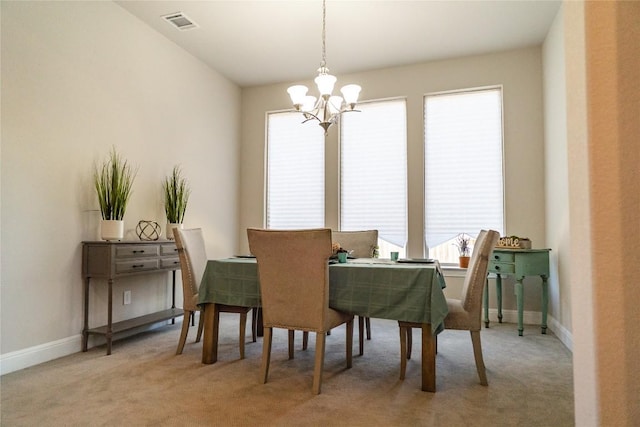 2616 Pine Branch Rd, Leander, TX 78641 - dining area with a chandelier and carpet floors