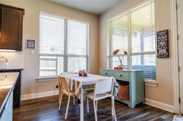 2616 Pine Branch Rd, Leander, TX 78641 - dining room with dark wood-style floors and plenty of natural light