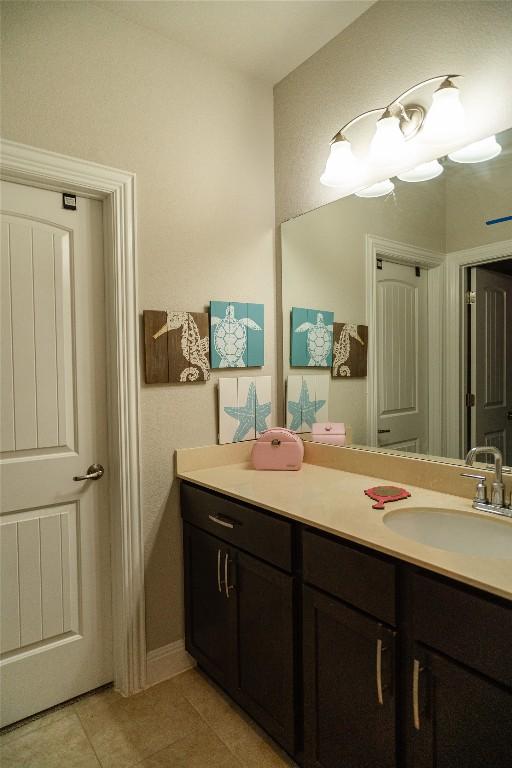 2616 Pine Branch Rd, Leander, TX 78641 - bathroom with tile patterned floors and vanity
