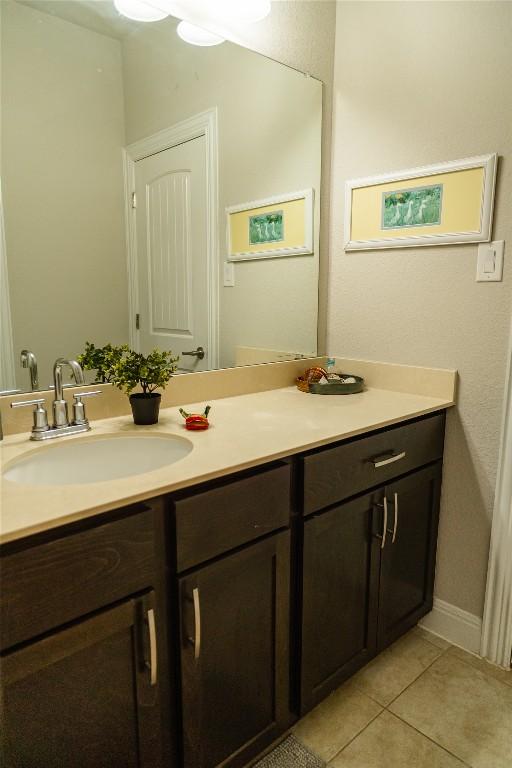 2616 Pine Branch Rd, Leander, TX 78641 - bathroom featuring vanity and tile patterned floors