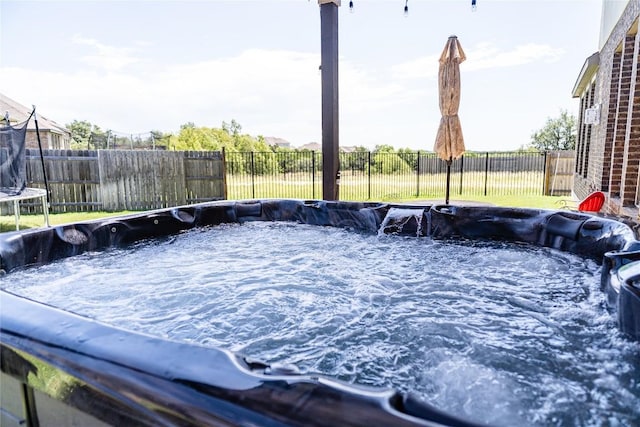 2616 Pine Branch Rd, Leander, TX 78641 - view of swimming pool featuring a hot tub, a fenced backyard, and a trampoline