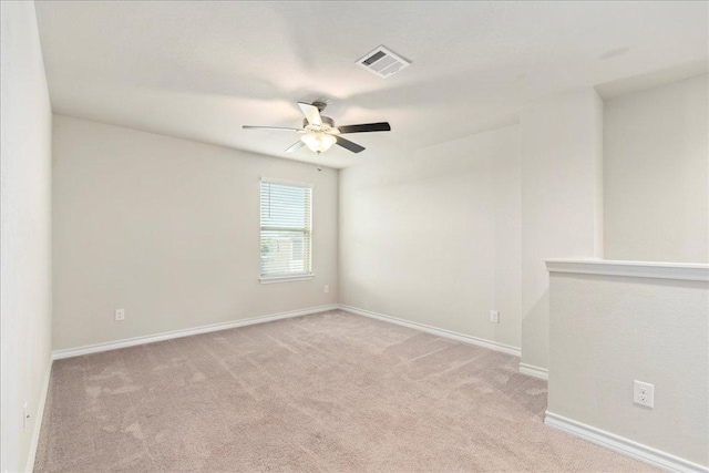 1629 W Broade St, Leander, TX 78641 - spare room featuring light carpet and a ceiling fan