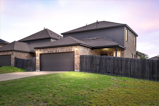 1629 W Broade St, Leander, TX 78641 - view of front of home featuring brick siding, an attached garage, driveway, and roof with shingles