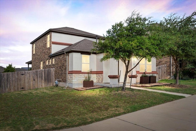 1629 W Broade St, Leander, TX 78641 - view of front facade featuring stone siding and stucco siding