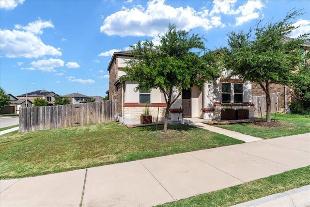 1629 W Broade St, Leander, TX 78641 - obstructed view of property with stone siding and stucco siding