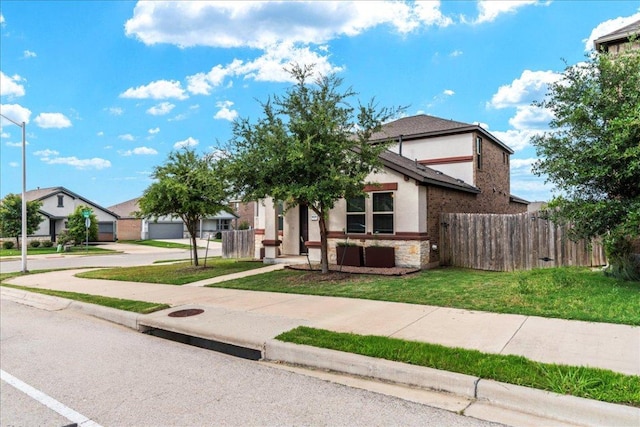 1629 W Broade St, Leander, TX 78641 - view of front facade featuring stone siding, stucco siding, and driveway