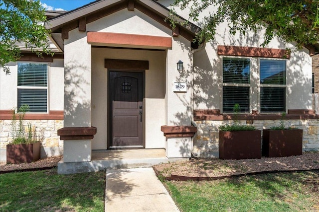 1629 W Broade St, Leander, TX 78641 - property entrance with stone siding and stucco siding