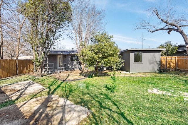 2105 Brunswick, Austin, TX 78723 - fenced backyard with an outdoor structure and a patio area