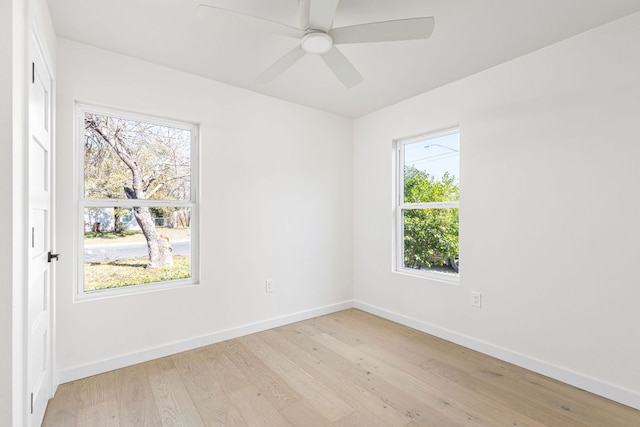 2105 Brunswick, Austin, TX 78723 - unfurnished room featuring light wood finished floors, healthy amount of natural light, and ceiling fan