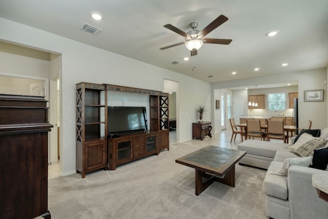 502 Saratoga Ln, Georgetown, TX 78633 - living room featuring ceiling fan, recessed lighting, and light colored carpet