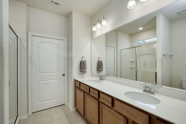 502 Saratoga Ln, Georgetown, TX 78633 - full bathroom with a shower stall, tile patterned flooring, and double vanity
