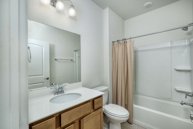 502 Saratoga Ln, Georgetown, TX 78633 - bathroom featuring shower / bath combo with shower curtain, vanity, and tile patterned floors