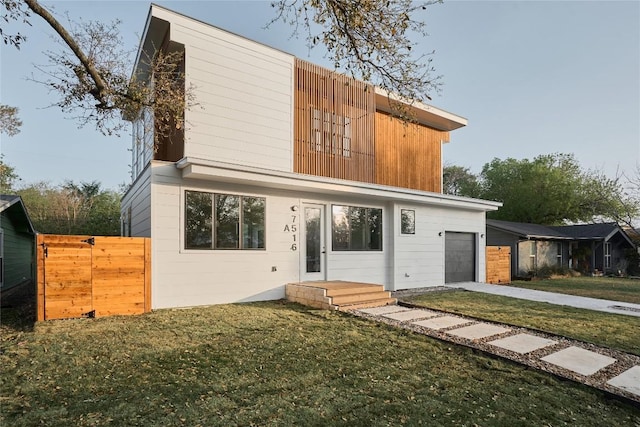 7516 Northcrest Blvd Unit 1, Austin, TX 78752 - view of front facade with an attached garage and driveway