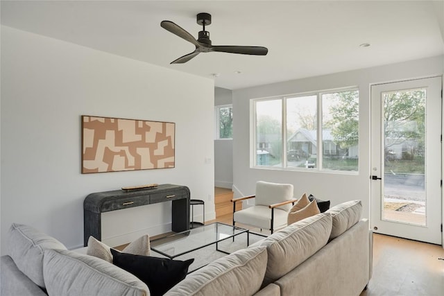 7516 Northcrest Blvd Unit 1, Austin, TX 78752 - living area featuring light wood-style flooring and ceiling fan