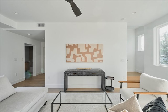 7516 Northcrest Blvd Unit 1, Austin, TX 78752 - living area with a ceiling fan, wood finished floors, and recessed lighting