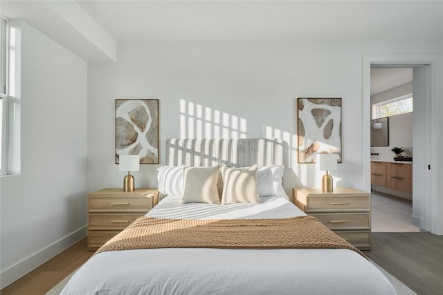 7516 Northcrest Blvd Unit 1, Austin, TX 78752 - bedroom featuring wood finished floors and baseboards
