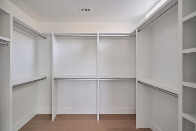 7516 Northcrest Blvd Unit 1, Austin, TX 78752 - spacious closet featuring wood finished floors