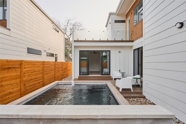 7516 Northcrest Blvd Unit 1, Austin, TX 78752 - entrance to property with a wooden deck and board and batten siding