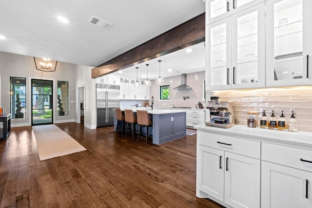 104 Hazeltine Dr, Georgetown, TX 78628 - kitchen featuring stainless steel built in refrigerator, light countertops, tasteful backsplash, and recessed lighting