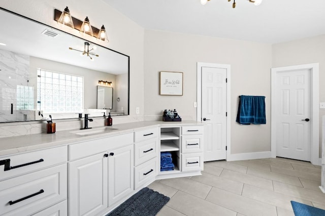 104 Hazeltine Dr, Georgetown, TX 78628 - full bath featuring vanity, a marble finish shower, and tile patterned floors