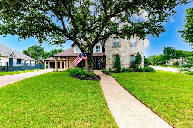 104 Hazeltine Dr, Georgetown, TX 78628 - view of front of property with stone siding and concrete driveway