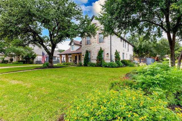 104 Hazeltine Dr, Georgetown, TX 78628 - view of front of home featuring stone siding