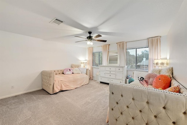 104 Hazeltine Dr, Georgetown, TX 78628 - bedroom with light colored carpet and ceiling fan