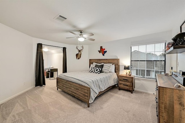 104 Hazeltine Dr, Georgetown, TX 78628 - bedroom featuring light carpet and a ceiling fan