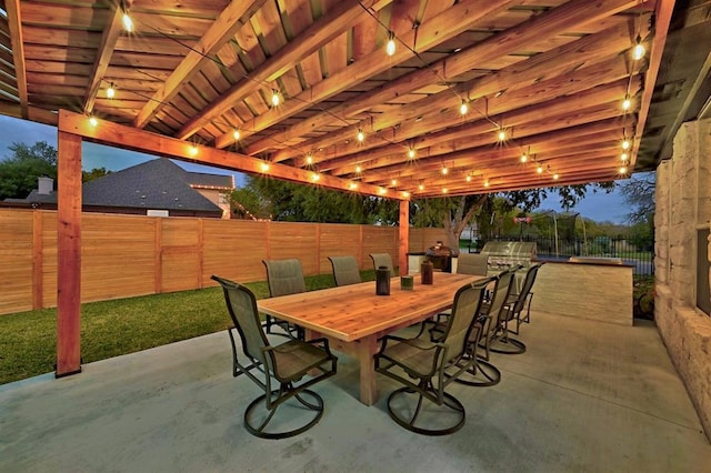 104 Hazeltine Dr, Georgetown, TX 78628 - fenced backyard featuring a patio, grilling area, and outdoor dining space
