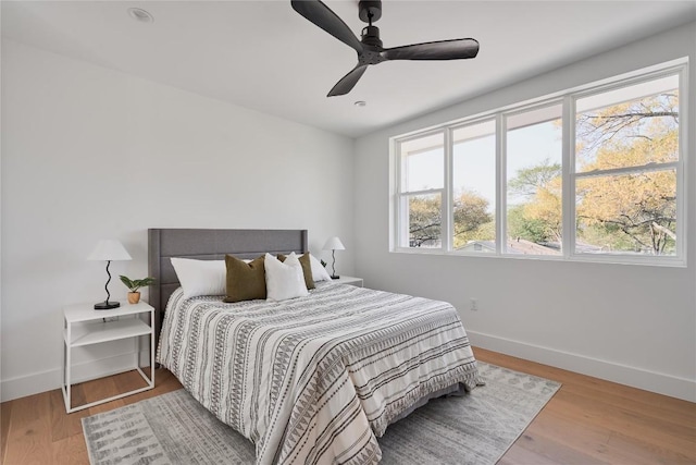 7516 Northcrest Blvd Unit 2, Austin, TX 78752 - bedroom featuring wood finished floors and ceiling fan