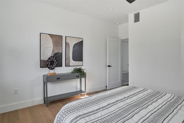 7516 Northcrest Blvd Unit 2, Austin, TX 78752 - bedroom with wood finished floors and baseboards