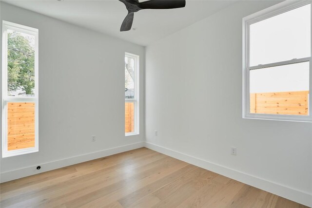 7516 Northcrest Blvd Unit 2, Austin, TX 78752 - empty room with light wood-style floors and a ceiling fan