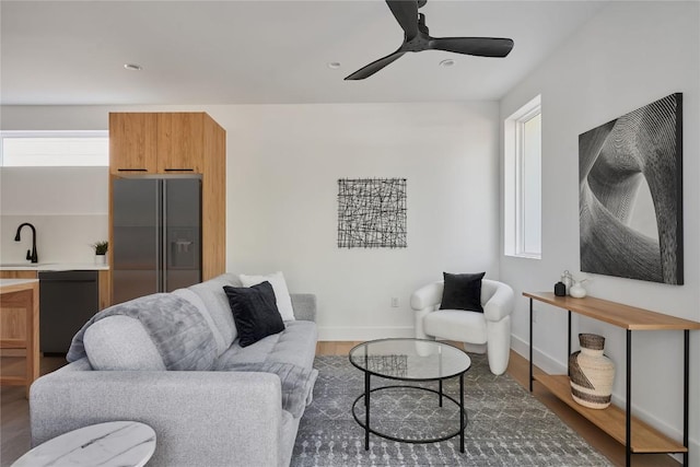 7516 Northcrest Blvd Unit 2, Austin, TX 78752 - living room with healthy amount of natural light, wood finished floors, ceiling fan, and recessed lighting
