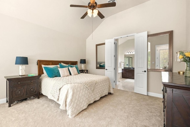 106 Tonkawa Trl W, Austin, TX 78738 - bedroom featuring light colored carpet, lofted ceiling, connected bathroom, and ceiling fan