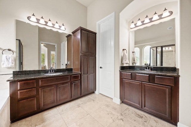 106 Tonkawa Trl W, Austin, TX 78738 - full bathroom with two vanities and tile patterned flooring