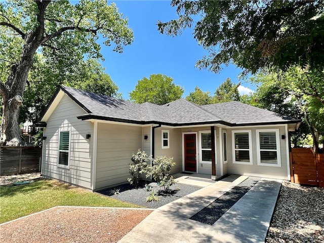 1126 Linden St Unit 2, Austin, TX 78702 - view of front facade with roof with shingles