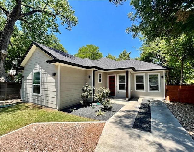 1126 Linden St Unit 2, Austin, TX 78702 - view of front of home featuring a shingled roof
