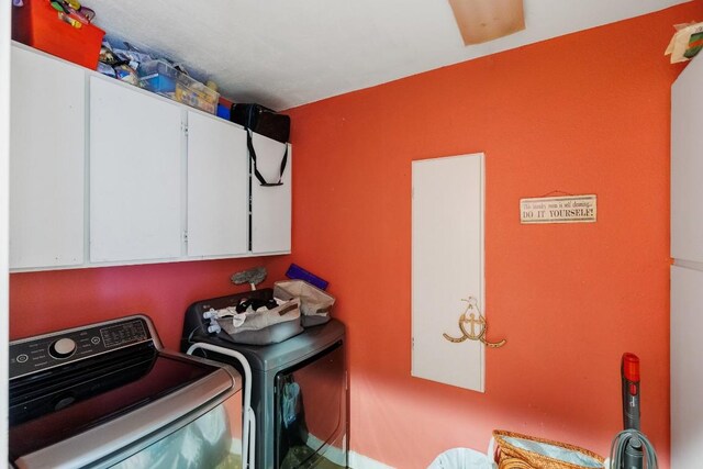 4842 W Fm 2147, Horseshoe Bay, TX 78657 - washroom featuring cabinet space and washing machine and clothes dryer