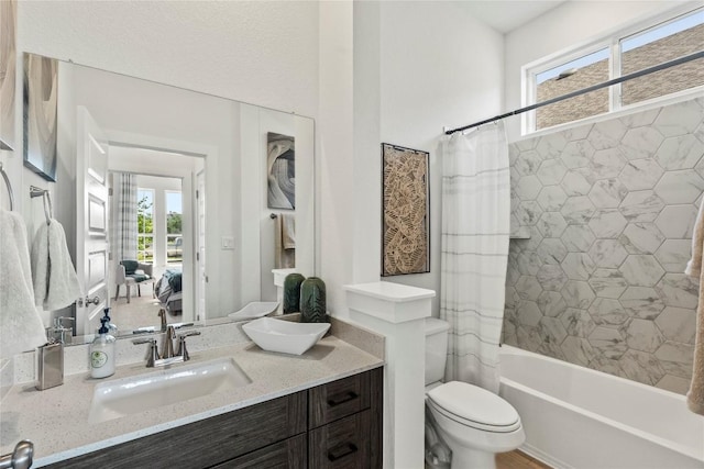 19512 Erna Dr, Pflugerville, TX 78660 - full bathroom featuring vanity and shower / tub combo