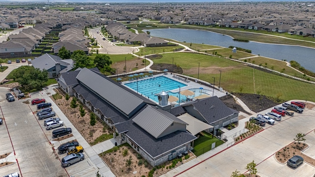 19512 Erna Dr, Pflugerville, TX 78660 - aerial perspective of suburban area featuring a nearby body of water and a pool