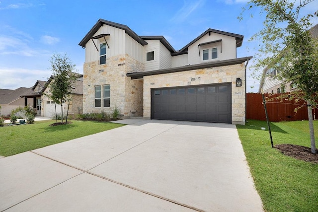 1601 Cardinal Ln, Round Rock, TX 78681 - contemporary home featuring stone siding, driveway, board and batten siding, and a garage