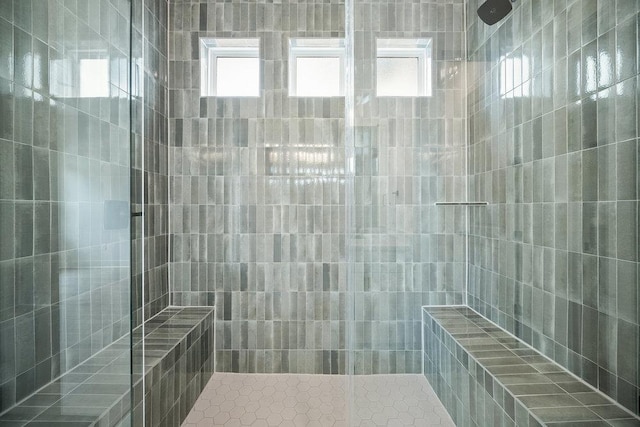 1601 Cardinal Ln, Round Rock, TX 78681 - full bathroom with a tile shower and plenty of natural light